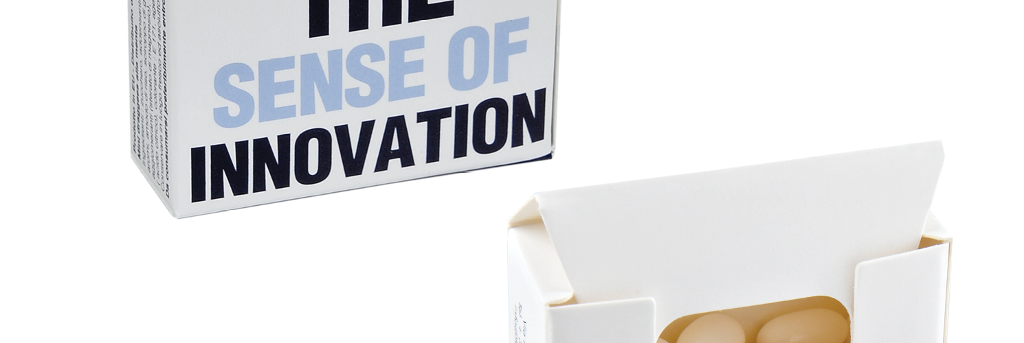 Pastilky v reklamní papírové krabičce