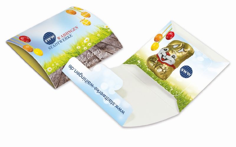 Čokoládový zajíček v reklamní obálce