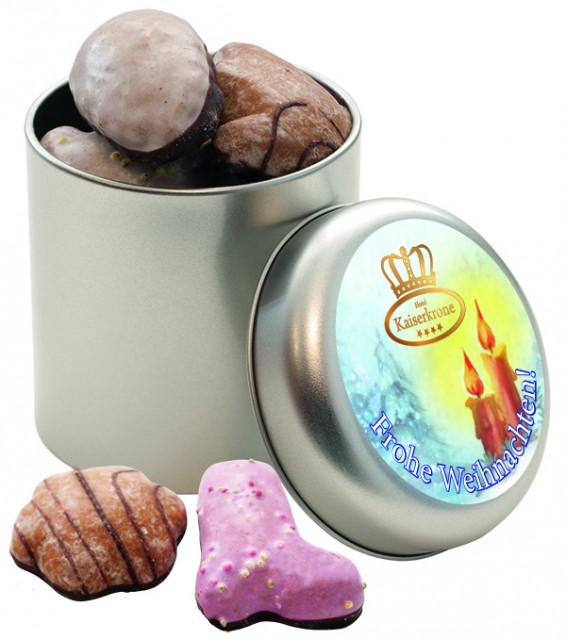 Silver round tin filled with gingerbread mix
