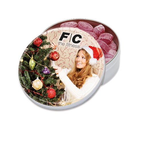 Kulatá plechovka s bonbónky s příchutí svařeného vína