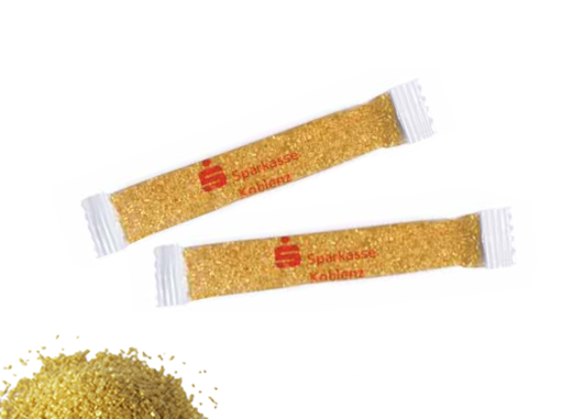 Zlatý cukr v reklamním obalu