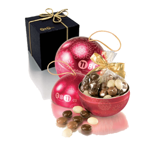 Tin ball with christmas dragees chocolate