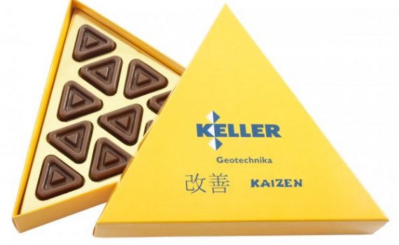 11 triangular chocolates in cardboard boxes