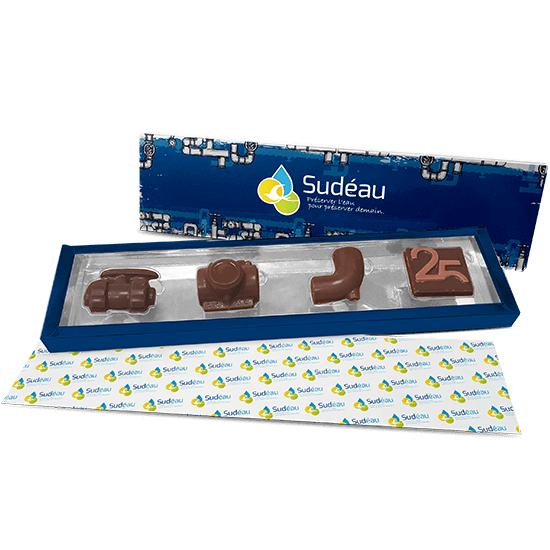 Lined carton box filled with custom made chocolate pieces